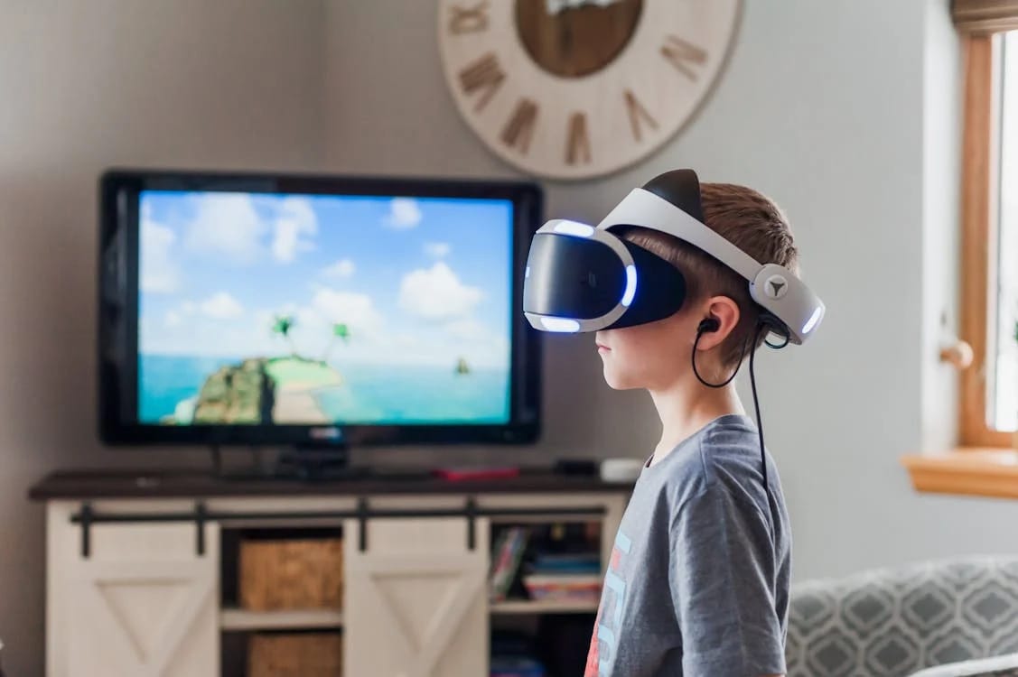 Representative Image. Boy Wearing a Black and White Virtual Reality Goggles. Jessica Lewis (Pexels).