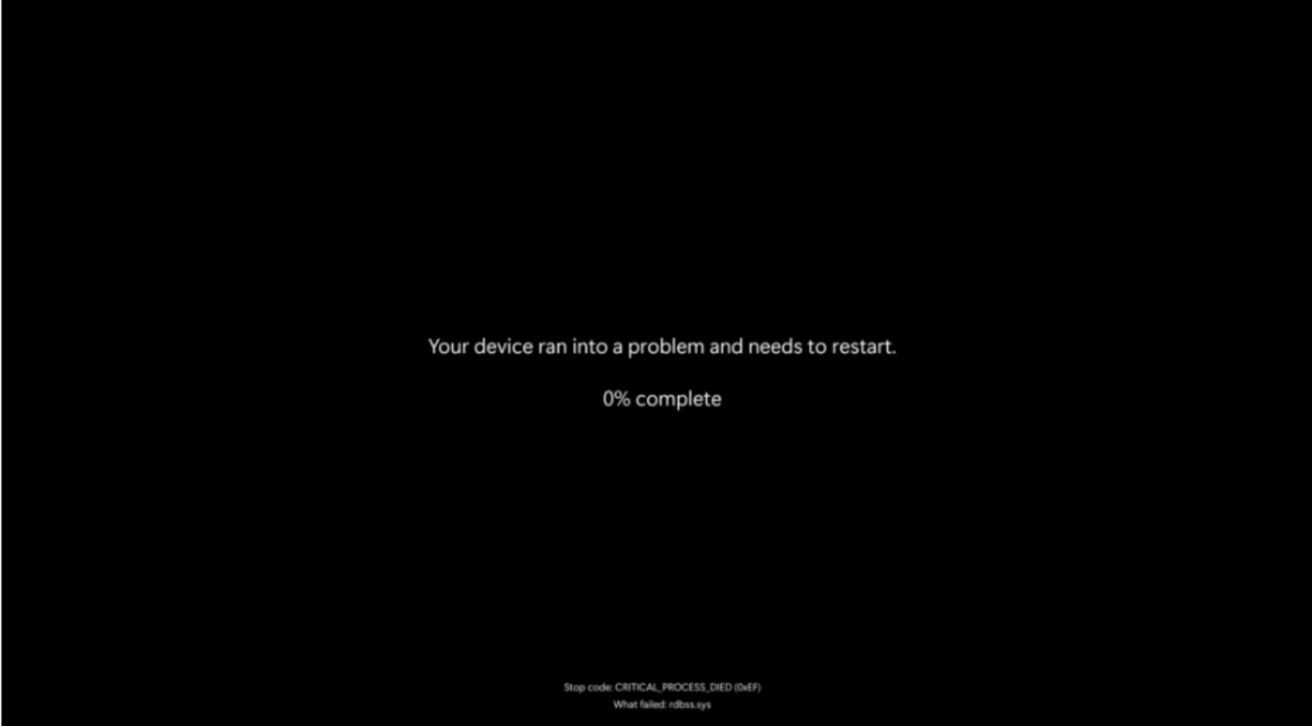 screen displaying a Windows system error message stating, "Your device ran into a problem and needs to restart.