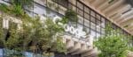 Google logo is prominently displayed on the exterior of a modern office building