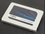 Crucial MX300 525GB SATA III solid-state drive with black casing and white Crucial branding label showing model number and technical specifications on top surface