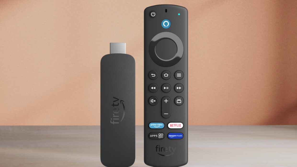 Amazon Fire TV streaming device with remote control displaying the Fire TV interface on a television screen.