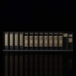 Close-up view of Nvidia Vera Rubin superchip showing dual Rubin GPU dies and Vera CPU with green circuit board and metallic cooling components