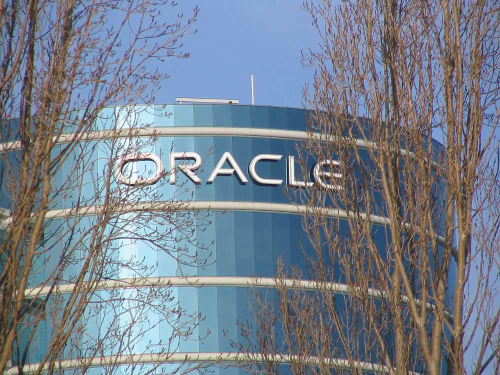 Oracle headquarters building exterior displaying the Oracle logo at the company's Redwood City, California campus