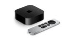 Apple TV 4K 3rd generation product shot on a dark background showing the compact black set-top box alongside the Siri Remote