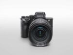 Sony Alpha 7R VI mirrorless camera body with FE 28-70mm F2 GM lens attached, shown from the front and top against a plain background