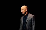 Jeff Bezos standing on stage at the Blue Origin Blue Moon lunar lander event in Washington DC in 2019