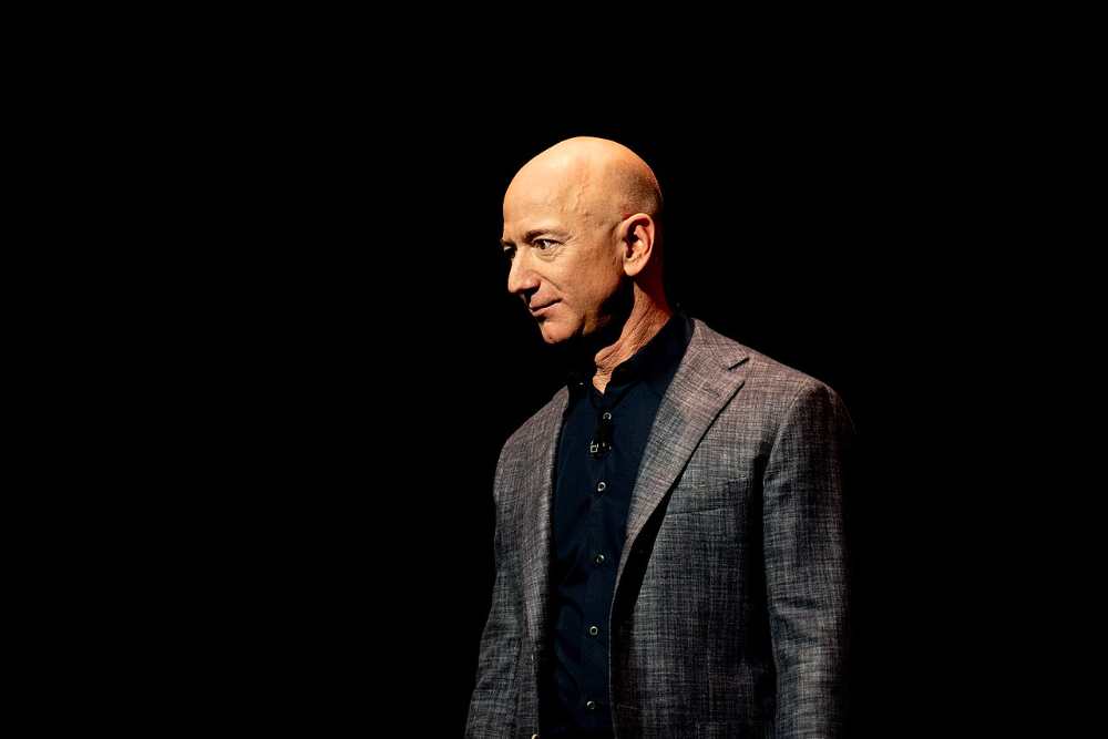 Jeff Bezos standing on stage at the Blue Origin Blue Moon lunar lander event in Washington DC in 2019