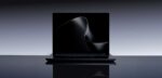Microsoft Surface Laptop Ultra in Platinum finish showing front display and keyboard on a dark background