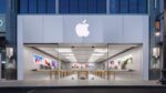 Apple Town Square retail store interior with wooden shelving and product display tables