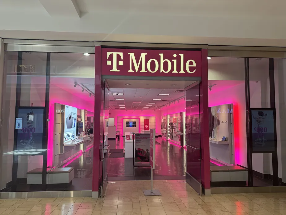 T-Mobile storefront at The Shops at Mission Viejo in California, featuring the company's magenta branding and modern retail design